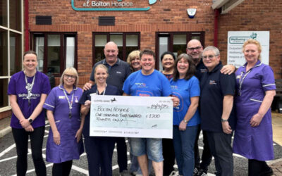 MND Manchester & District Branch presents cheque to Bolton Hospice